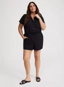 Model wearing Torrid Plus Size Ripstop Romper outdoors
